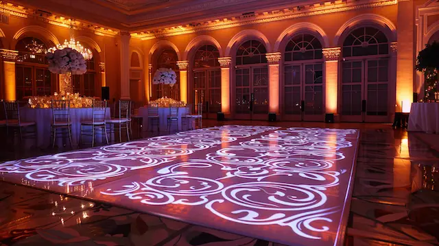 a room with a dance floor and lights