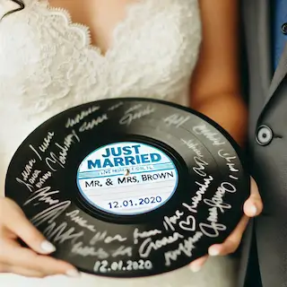 vinyl record wedding sign in book