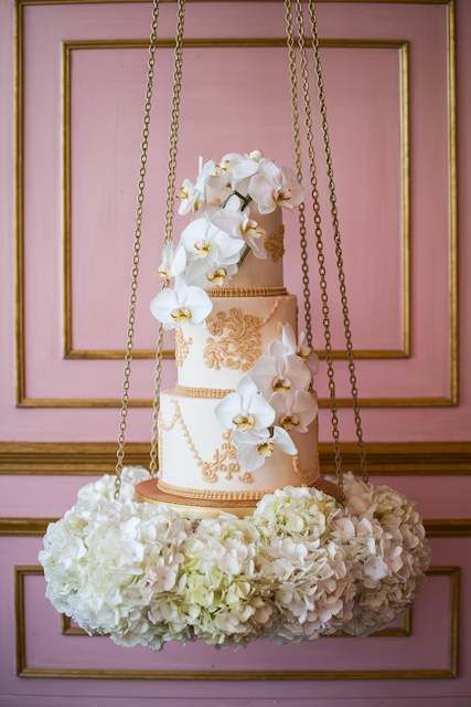 Suspended Cake Installation with Gold Accents