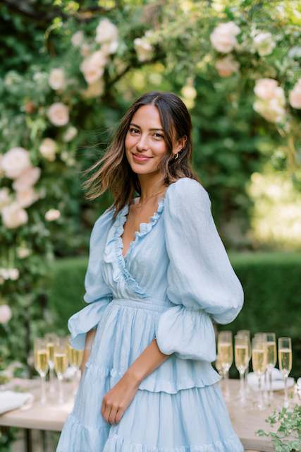 Bridesmaid wearing puffy sleeves dress at rehearsal dinner Bridesmaid wearing puffy sleeves dress at rehearsal dinner