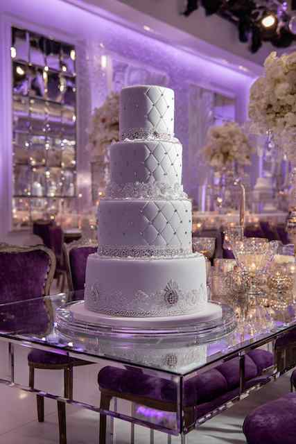 Quilted fondant with brooch detail wedding cake