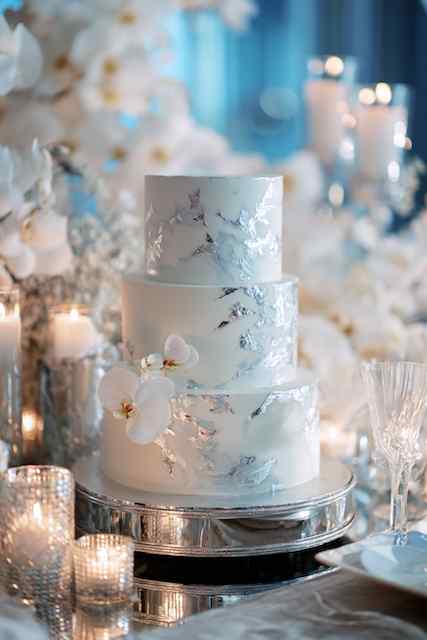 Silver-stacked tiers wedding cake