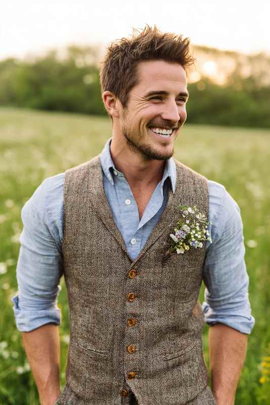 groom in Chambray shirt with tweed vest groom in Chambray shirt with tweed vest