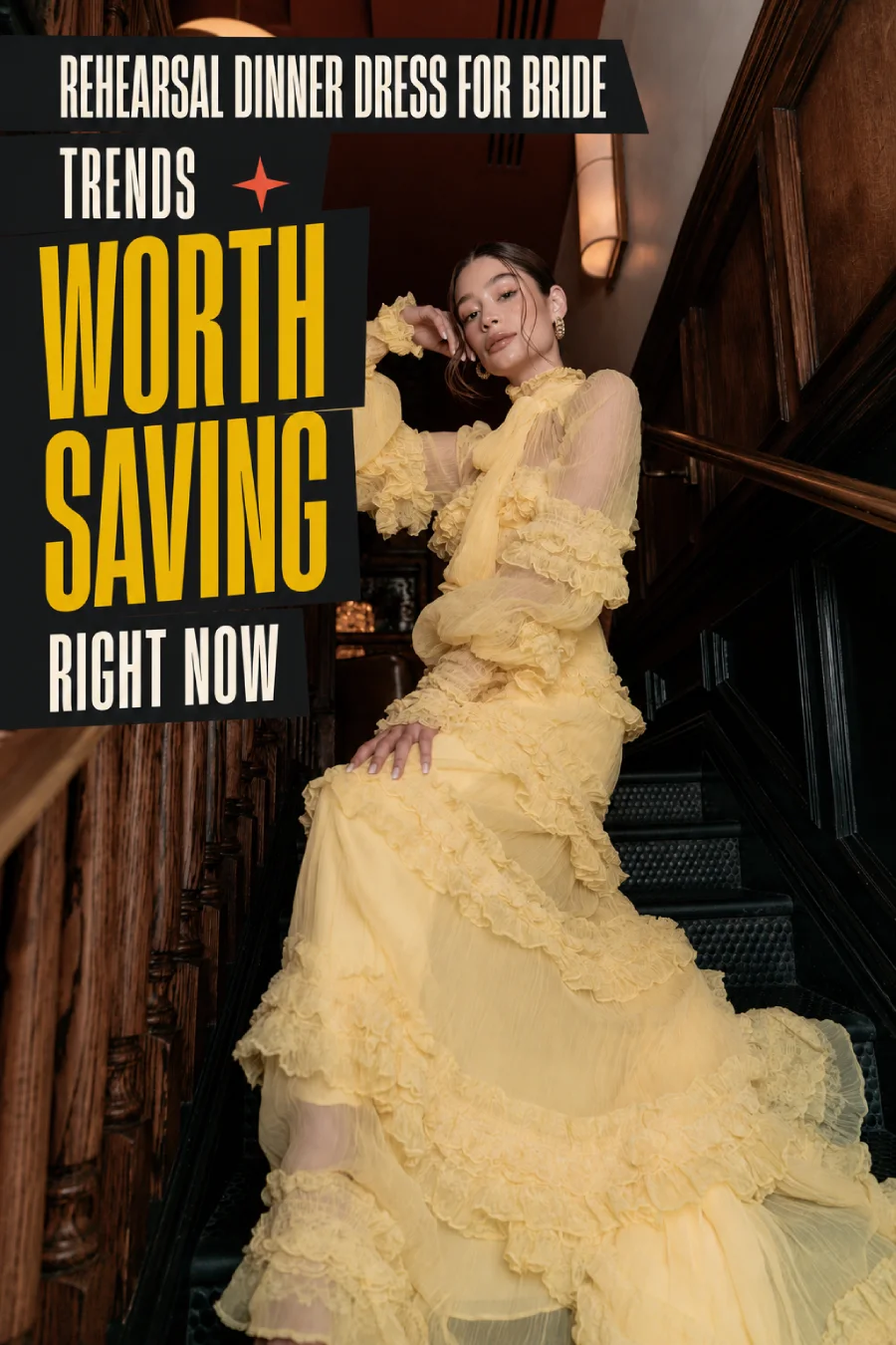 Bride in a dramatic yellow ruffled gown on a dark wood staircase with black and gold headline ribbons