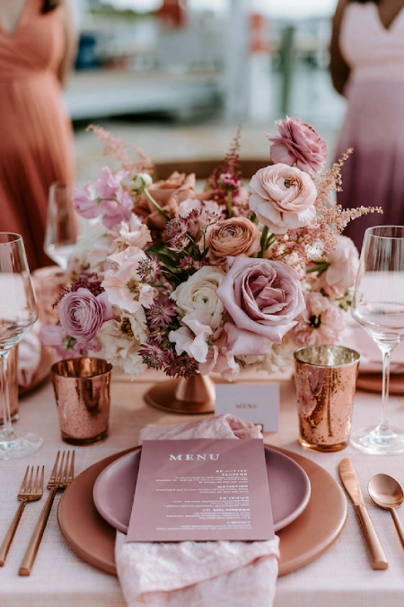 Terracotta Wedding Color Scheme: The Coziest, Most Iconic Palette Around 8 Terracotta and mauve wedding tablescape with blush florals, rose gold accents, and romantic reception decor